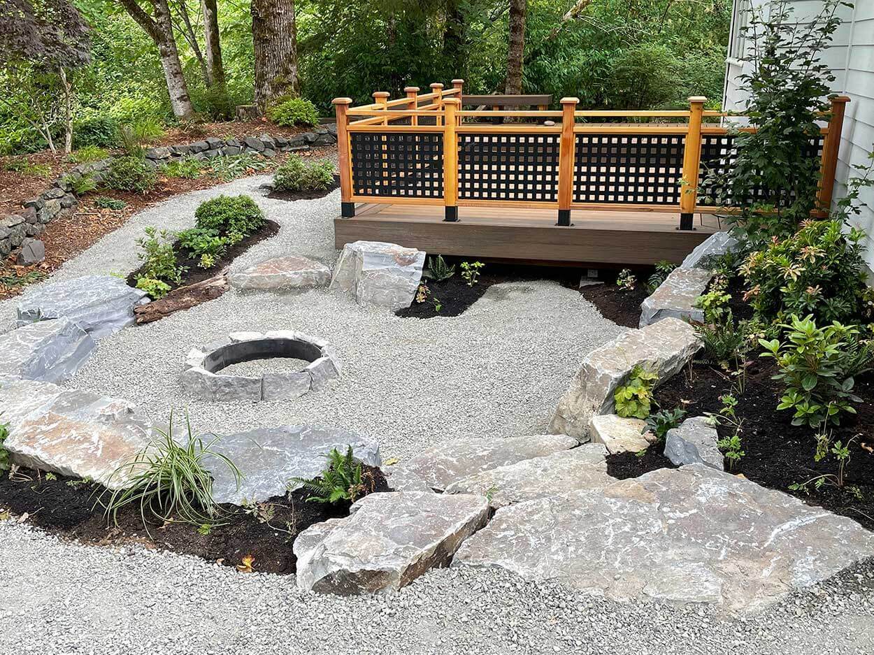 Minimalist garden featuring stones and greenery