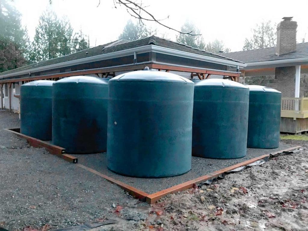 Row of blue water tanks